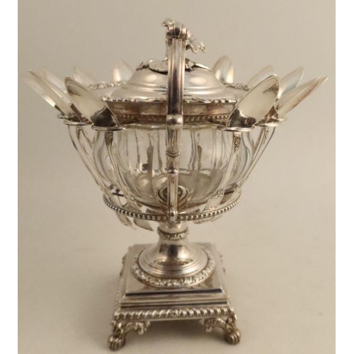 513 - A French silver and glass confiturier, raised on a covered pedestal, having two handles and fitted w... 