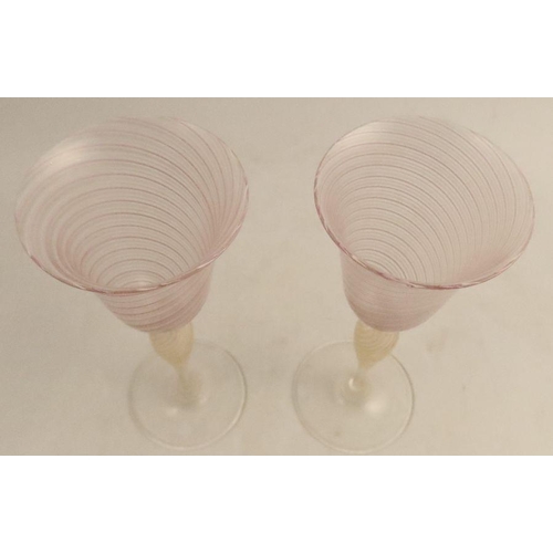 517 - A pair of Venetian glass wine glasses, with pink and white stripe bowl and yellow twist stem, height... 