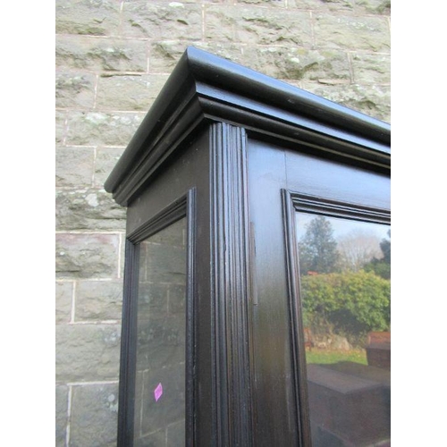 52 - A late 19th century ebonised glazed cabinet, width 39ins, height 80ins, depth 12ins