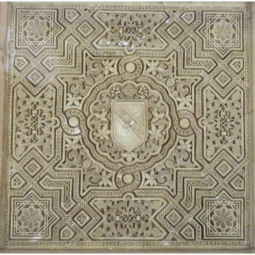 526 - An Antique Islamic terracotta tile, decorated with a shield to the center and a geometric pattern, 1... 