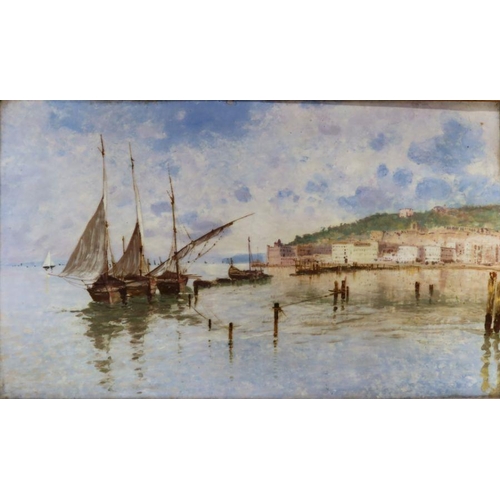 530 - A rectangular framed porcelain plaque, painted with a Continental view across water with boats and b... 