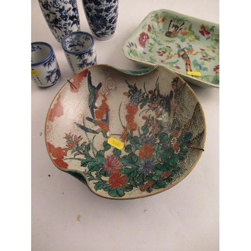 538 - A collection of oriental porcelain to include a pair of brush pots one af, a vase decorated with fig... 