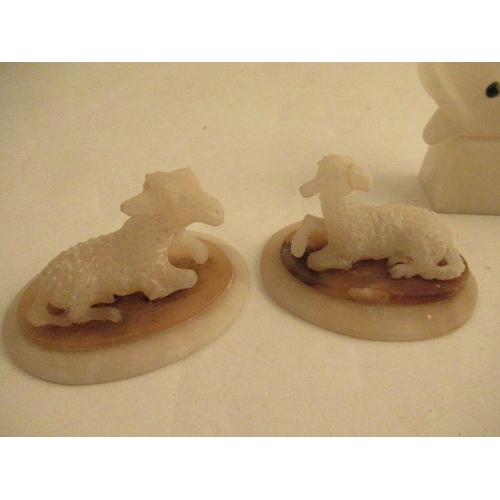 539 - A pair of 19th Century alabaster models of sheep AF together with model of a dolphin