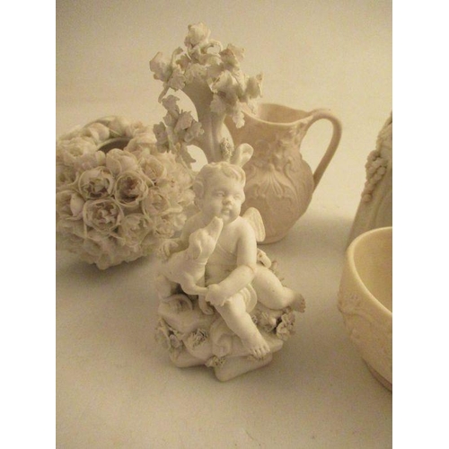 541 - A collection of Victorian parian porcelain, to include a pair of vases decorated with cherubs, a vas... 