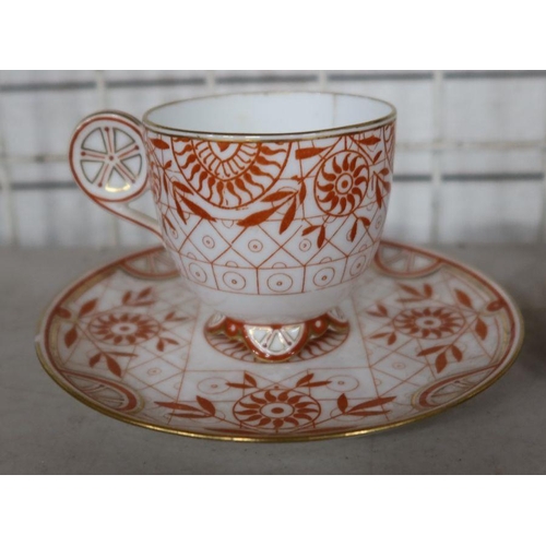 563 - A pair of Wedgwood Aesthetic movement cups and saucers, af, together with a Minton cup and saucer ma... 