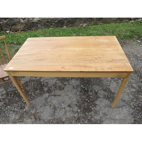 57 - An Ercol kitchen table, 27ins x 48ins, height 28ins, together with two kitchen chairs