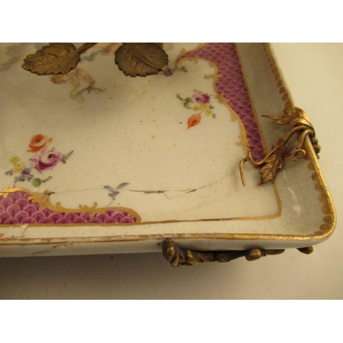 572 - A continental porcelain desk tray with armorial mounts supporting Ink well, pounce pot and a candle ... 