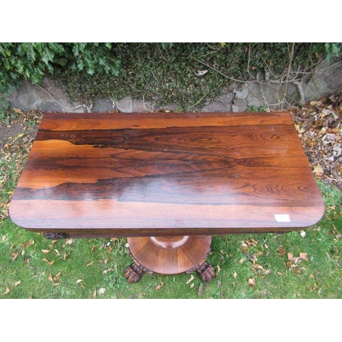 58 - A 19th century rosewood fold over table, width 36ins, height 28ins