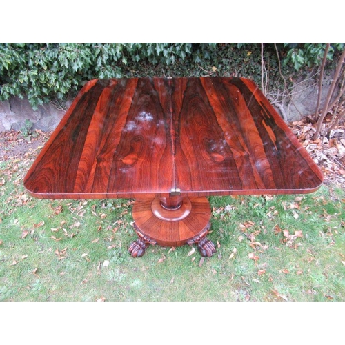 58 - A 19th century rosewood fold over table, width 36ins, height 28ins