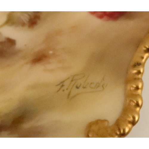 594 - A Royal Worcester cabinet plate, decorated with fruit to a mossy background by F Roberts, with shape... 