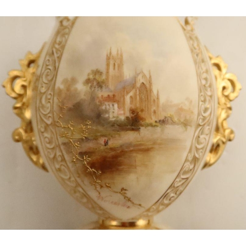 601 - A Grainger's Worcester vase, decorated with a view of Worcester Cathedral, to a pierced ivory ground... 