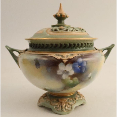 609 - A Royal Worcester covered vase, decorated with flowers by J Lander, shape number H165, height 5.5ins