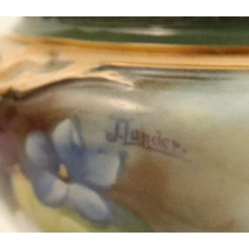 609 - A Royal Worcester covered vase, decorated with flowers by J Lander, shape number H165, height 5.5ins