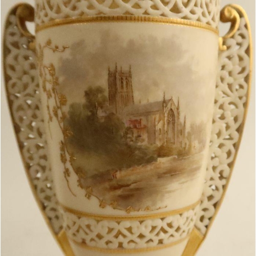 622 - A Graingers Worcester reticulated covered vase, the ivory body decorated with a view of Worcester Ca... 