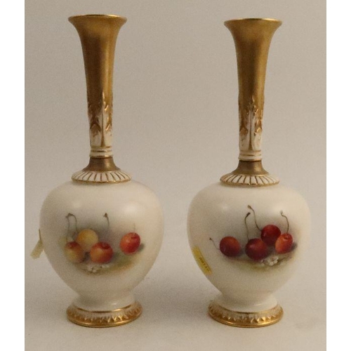 624 - A pair of Royal Worcester vases, the fronts decorated with fruit to a mossy background by Ricketts, ... 