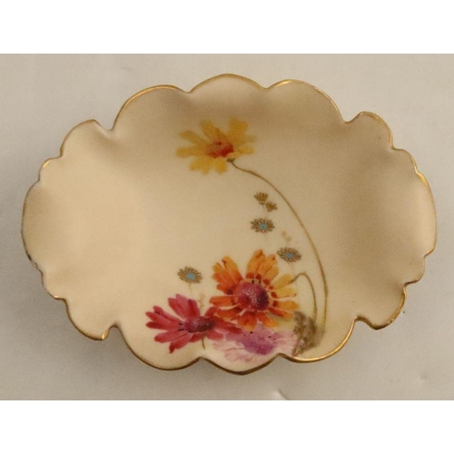 627 - A Graingers Worcester blush ivory hors d'oeuvre dish, decorated with flowers, together with a Royal ... 