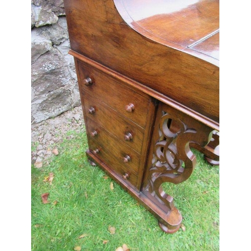 63 - A Victorian walnut davenport, with a secret rising drawer, width 22ins, height 43ins