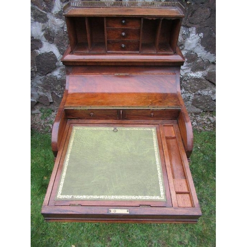 63 - A Victorian walnut davenport, with a secret rising drawer, width 22ins, height 43ins