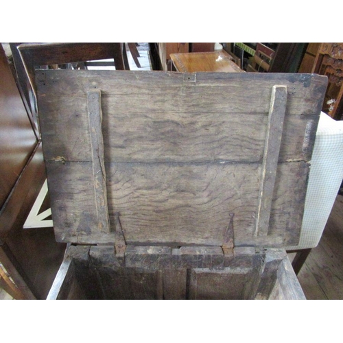 73 - An Antique oak coffer, width 31ins, height 28.5ins