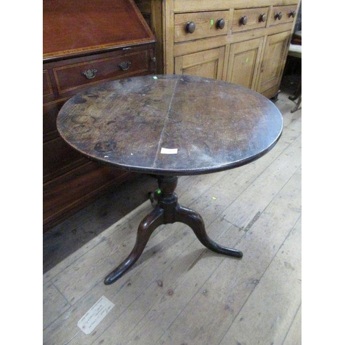 82 - An Antique oak tripod table, width 28ins