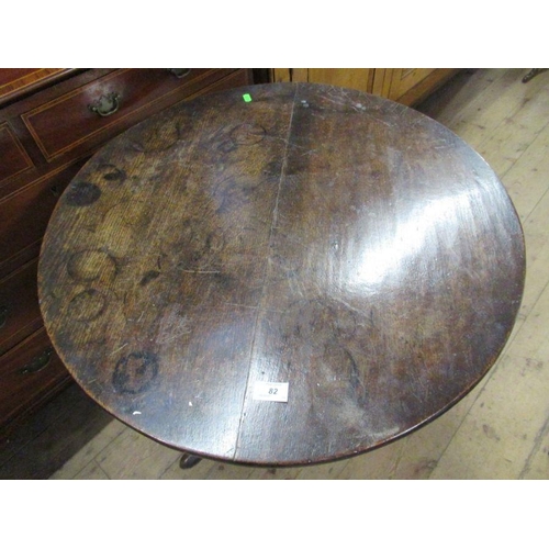 82 - An Antique oak tripod table, width 28ins