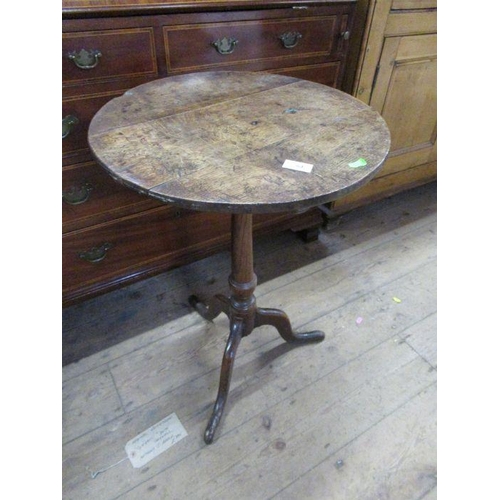 84 - An Antique oak tripod table, width 18.5ins