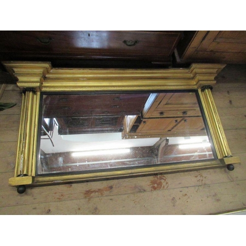 87 - A Regency gilt frame over mantle mirror, width 56ins, height 28ins