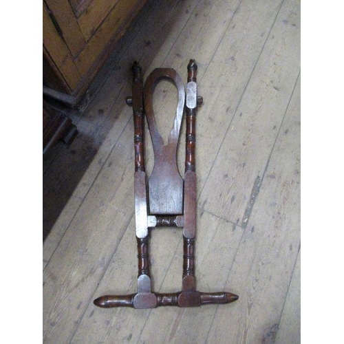 95 - A 19th century mahogany boot jack.