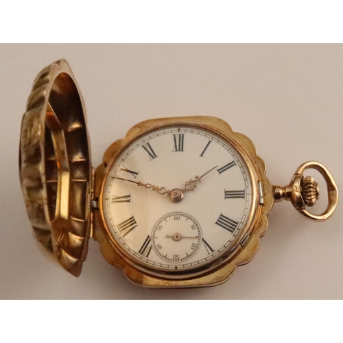 367 - A Continental yellow gold cased fob watch, the front cover inset with an enamel plaque depicting a c... 