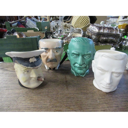 212 - Of political interest - 4 character jugs of Chamberlian, George V, Churchill and Attlee