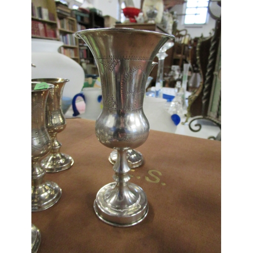 352 - 8 assorted silver goblets total weight  9 oz