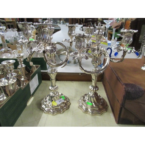 308 - A pair of silver plated candelabra  height 14.5ins