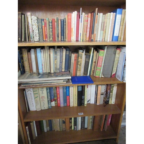 283 - A large collection of books to include Dickens, paper backs etc