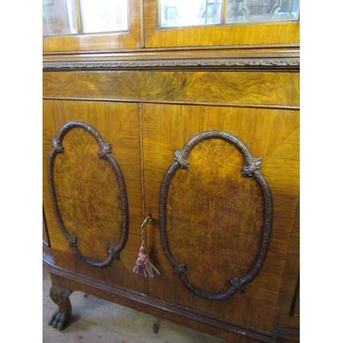 69 - A bow front display cabinet