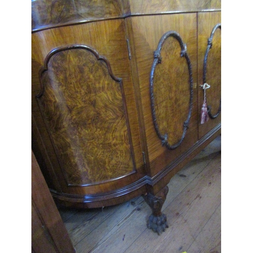 69 - A bow front display cabinet