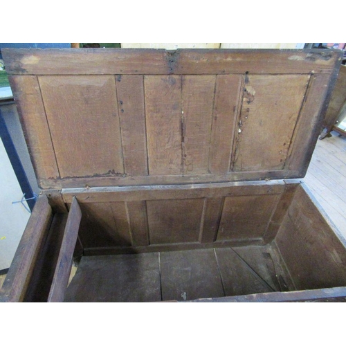 17 - An Antique oak coffer, 3 fielded panels to the top and 3 fielded panels to side with carved decorati... 