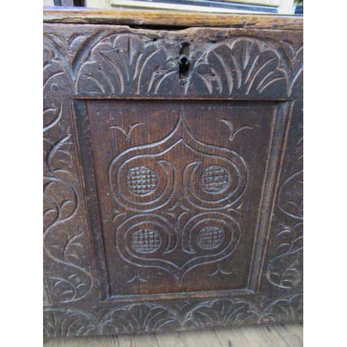 18 - An antique oak coffer with 3 fielded panels to the front, width 49.5ins, height 26ins, depth 23ins