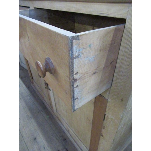 2 - A large pine chest, fitted with two short drawers over cupboards  width 58.5ins height 47ins depth 2... 