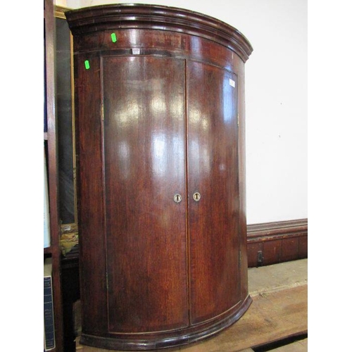 3 - A Georgian bow fronted corner cupboard width 26ins, height 41ins