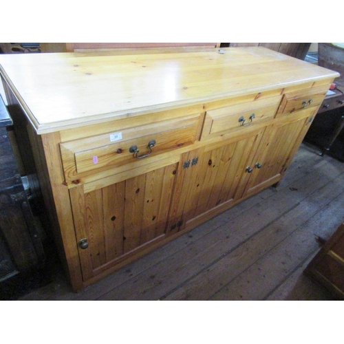 33 - A large pine side board , width 67ins, depth 24ins, height 36ins