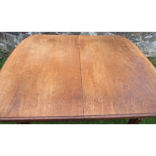 45 - A 19th century dining table with reeded legs, 52ins x 41ins, height 29ins