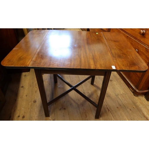 50 - A mahogany drop flap table, on square fluted legs united by a X stretcher, 43ins x 30ins, height 30i... 