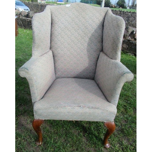 53 - A Georgian design wing back chair