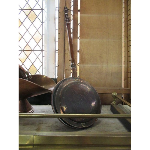 6 - An oak coal scuttle, together with a copper example, warming pan, pump and brass fire surround