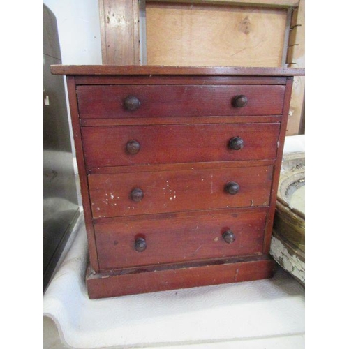 8 - A mahogany miniature chest of drawers height 12ins, width 12ins, depth 9ins