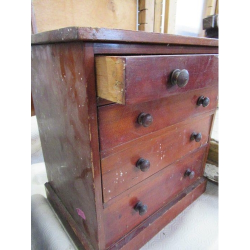 8 - A mahogany miniature chest of drawers height 12ins, width 12ins, depth 9ins