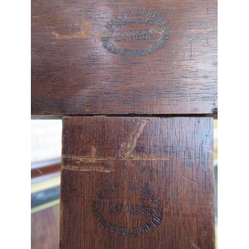 11 - An adjustable oak artists easel, stamped Halford Bros. Oxford St, London, height 72ins, width 29ins