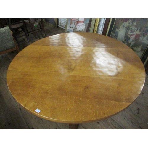 12 - A Robert 'Mouseman' Thompson of Kilburn oak circular dining table, with adze top, width 57ins, heigh... 