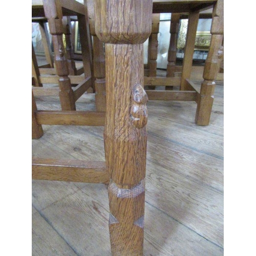 13 - A Robert 'Mouseman' Thompson of Kilburn set of six oak lattice back dining chairs,