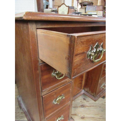 24 - A 19th century mahogany knee hole desk, width 31ins, depth 19ins, height 30.5ins